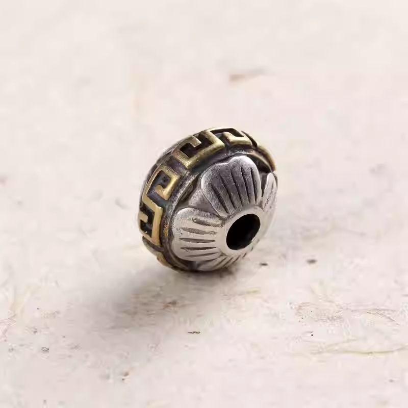 Sterling silver inlaid copper flyer bead spacer, functional jewelry art for bead alignment in Tibetan Buddhist Jewelry Culture.