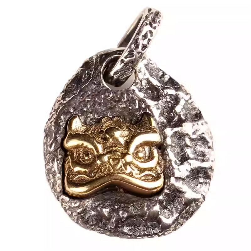 Hand-painted silver and stone Lion Dance amulet, a unique Jewelry art treasure for cultural enthusiasts.