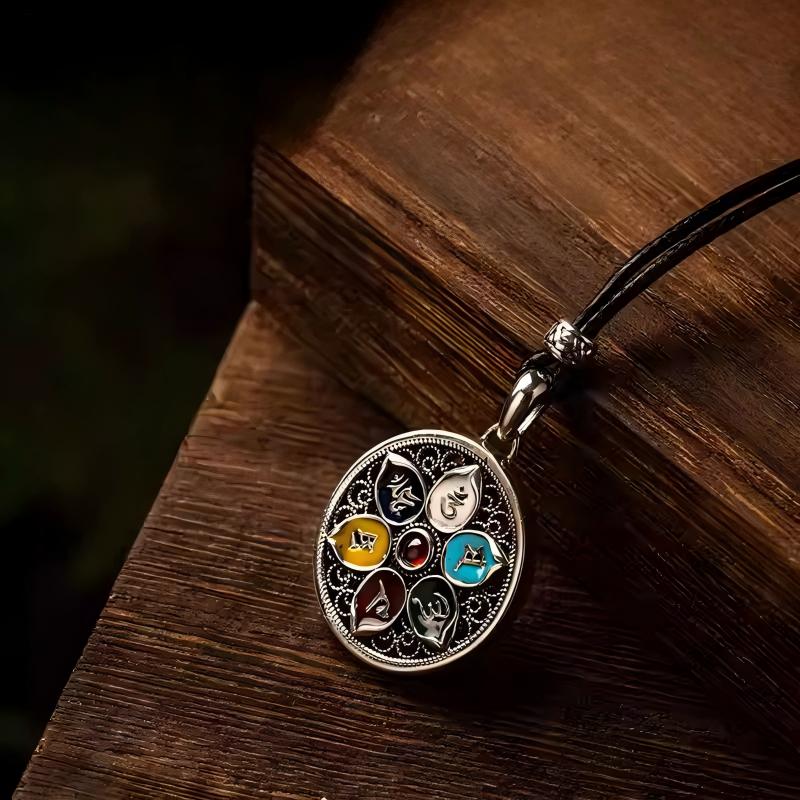 Handcrafted silver round lotus pendant with mantra engraving, Tibetan Buddhist design, perfect for personal adornment or spiritual jewelry collection.