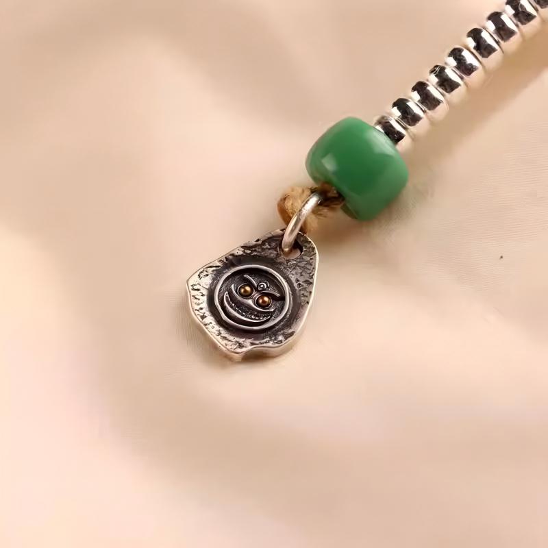 Pure silver mini beads with DIY spacers, handcrafted in Tibetan style, perfect for assembling personalized spiritual bead bracelets.