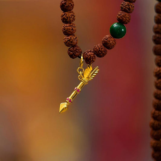 Tibetan Buddhist Jewelry Culture handmade gold-plated silver wealth arrow pendant, a powerful piece of Jewelry art for abundance.
