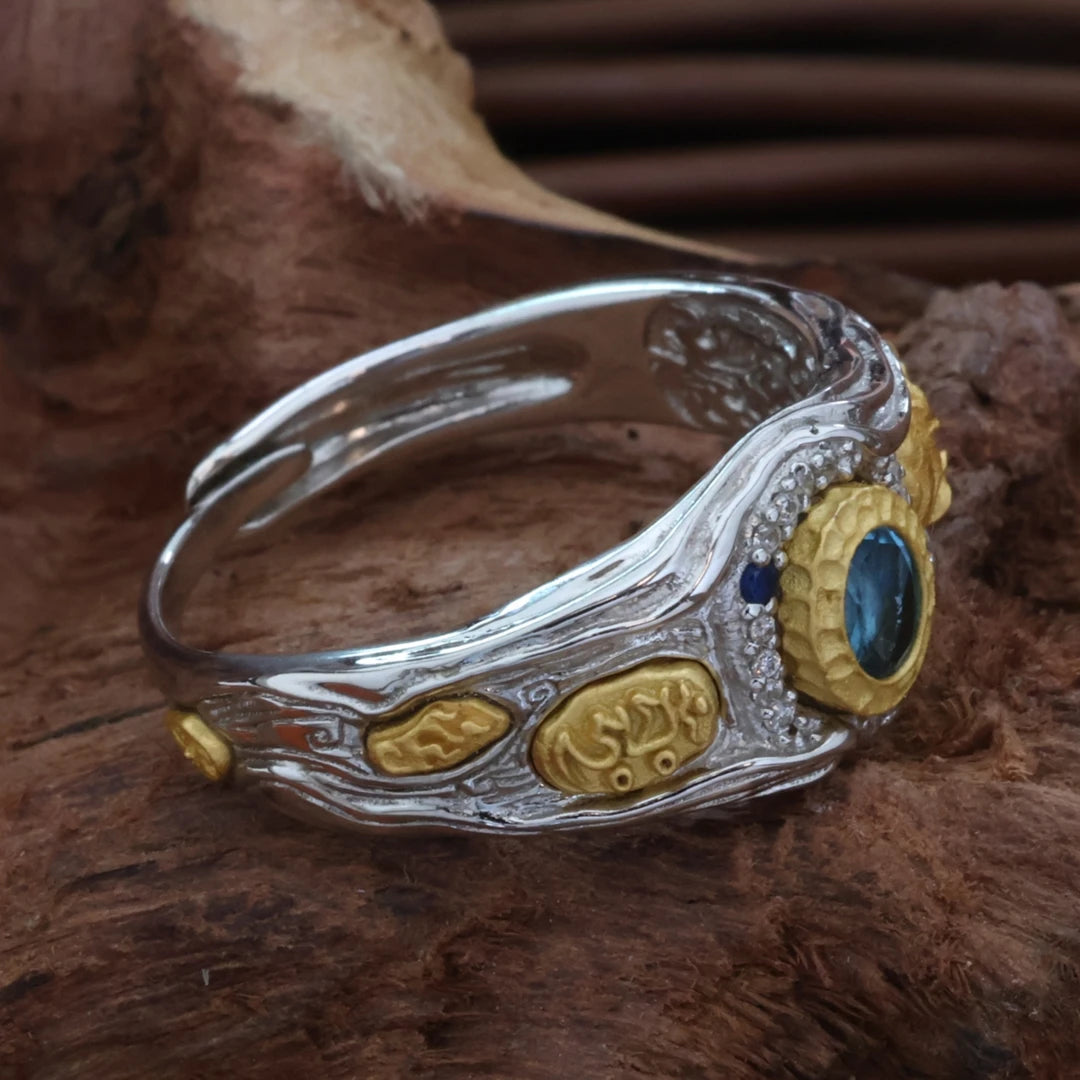 Bonding Beads ring with hand-painted Zaki Lhamo details, a unique piece of Tibetan Buddhist Jewelry Culture jewelry art.