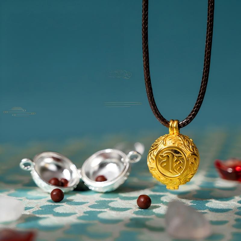 Hand-polished silver round Ghau pendant with Manjushri seed syllable, showcasing Tibetan-Buddhist Jewelry Culture.