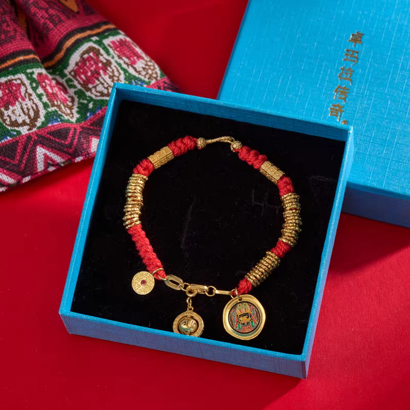 Handmade Zakiram red thread bracelet, inspired by Tibetan Buddhist Jewelry Culture, a jewelry art piece promoting luck, fortune, and protection.