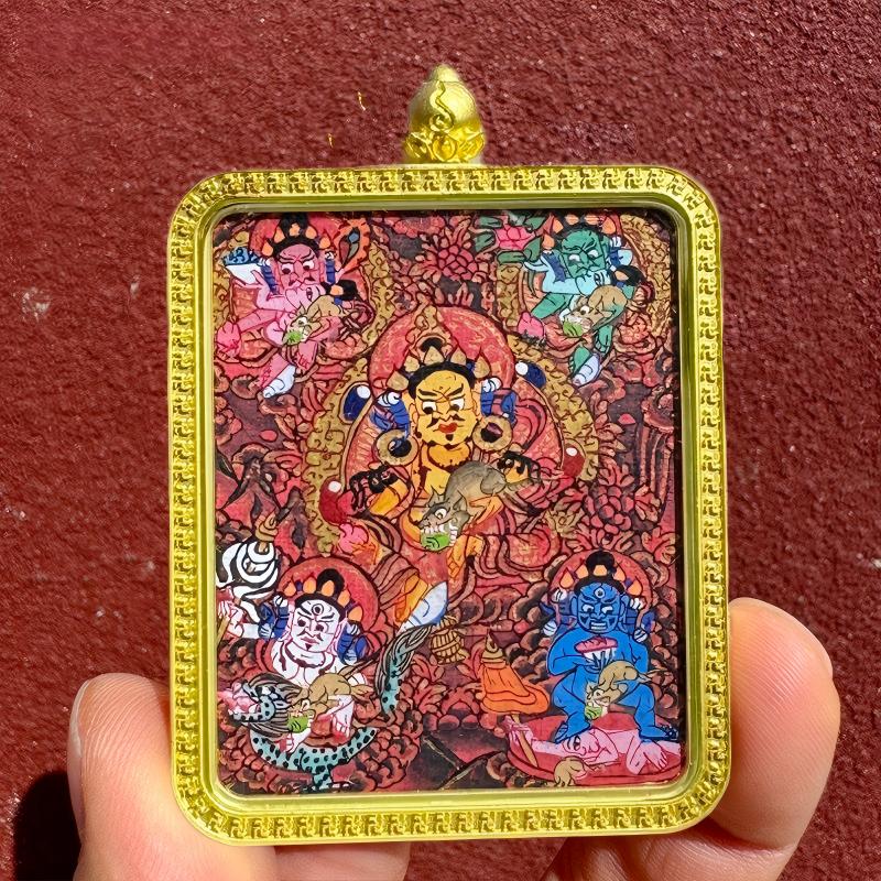 Pure handmade Tibetan Five Wealth Gods Thangka pendant, finely detailed Tibetan jewelry art, auspicious Buddhist talisman for protection and prosperity.