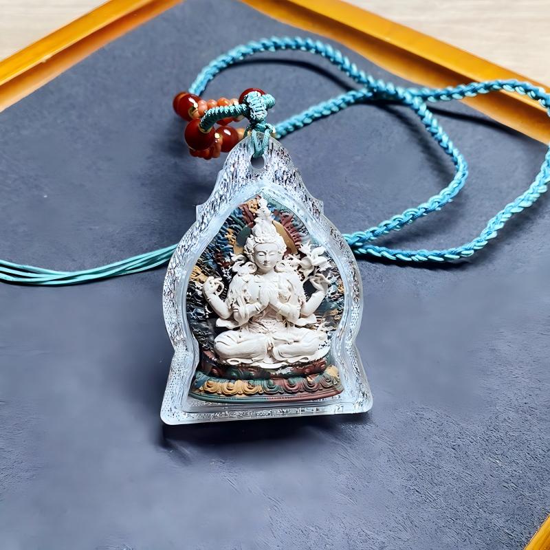 Pure handmade Tibetan Four-Armed Avalokiteshvara Thangka Gau box pendant, combining traditional craftsmanship with sacred Tibetan jewelry art.