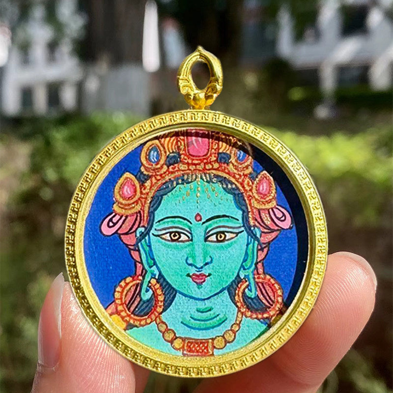 Pure handmade Tibetan pendant showing Green Tara in a small Thangka Gau box, combining traditional craftsmanship with Tibetan jewelry art.