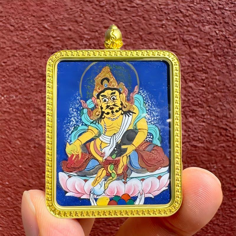 Pure handmade Tibetan pendant depicting Manjushri, Amitabha, and Samantabhadra, zodiac birth Buddhas, and guardian deities, combining traditional craftsmanship with jewelry art.