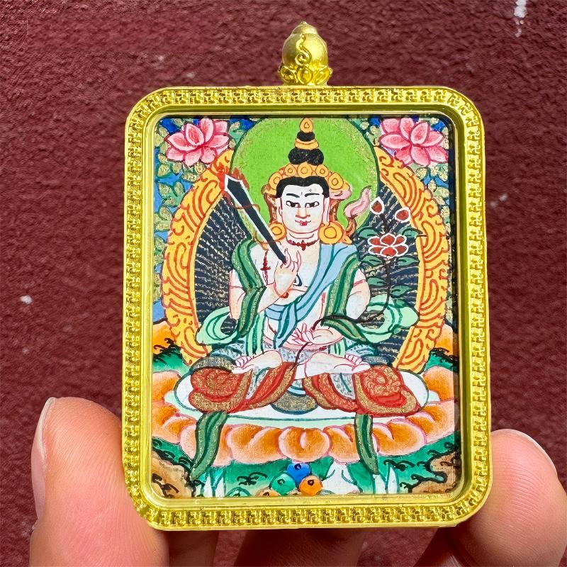 Pure handmade Tibetan pendant depicting Manjushri and Samantabhadra, zodiac birth Buddhas and guardian protectors, combining traditional craftsmanship with jewelry art.