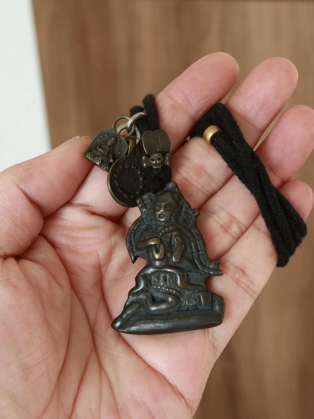 Four-Armed Guanyin Bodhisattva Iron Statue, handcrafted with care and dedication in Tibetan Buddhist Jewelry Culture, symbolizing compassion and divine guidance.