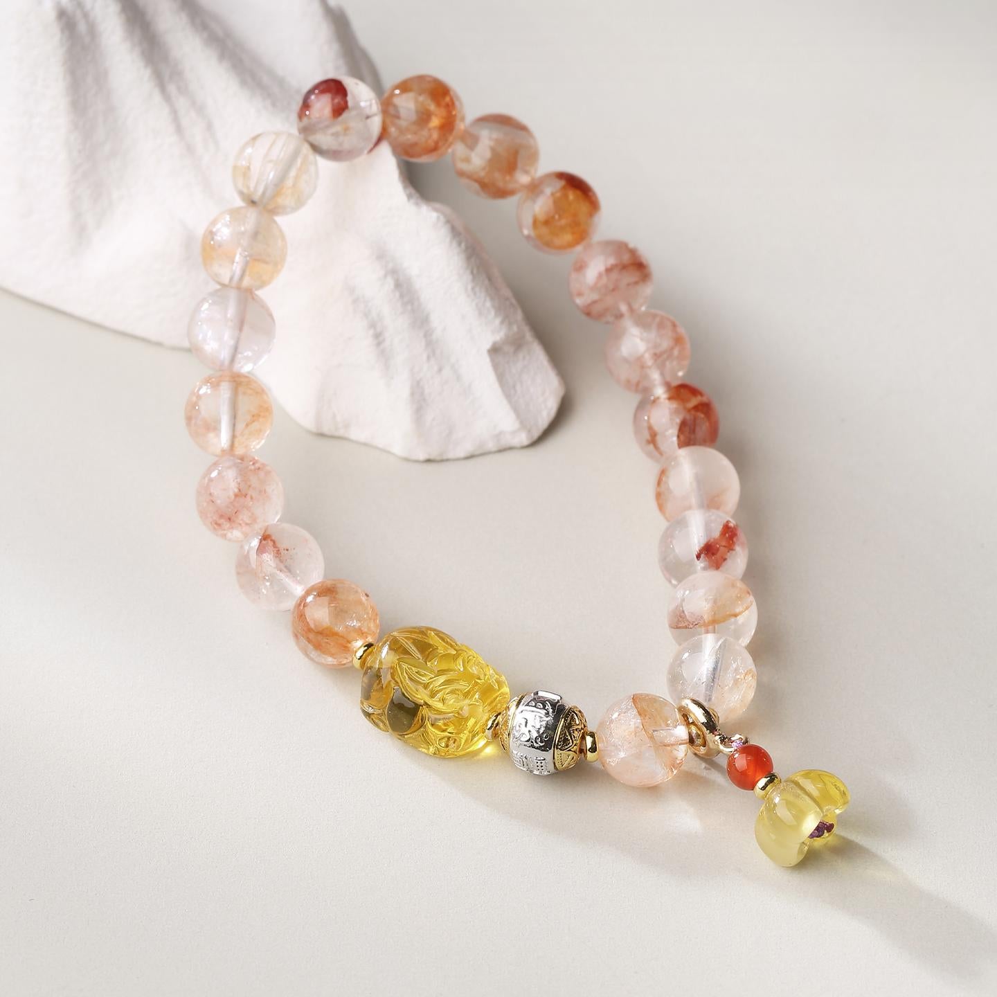 Tibetan Buddhist Jewelry Art: Hand-Painted Crystal and Golden Amber Pi Xiu Bracelet for wealth attraction and spiritual protection in Tibetan tradition