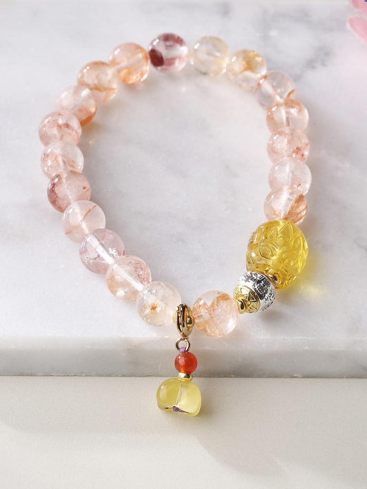 Tibetan Buddhist Jewelry Art: Hand-Painted Crystal and Golden Amber Pi Xiu Bracelet for wealth attraction and spiritual protection in Tibetan tradition