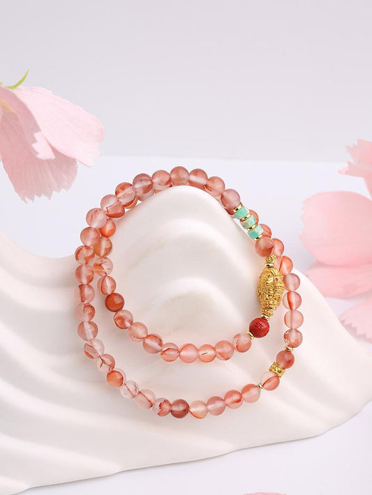 Tibetan Buddhist Jewelry Art: Hand-Painted Cinnabar and Glass Multi-Strand Bracelet for spiritual protection and energy cleansing in Tibetan Buddhist tradition