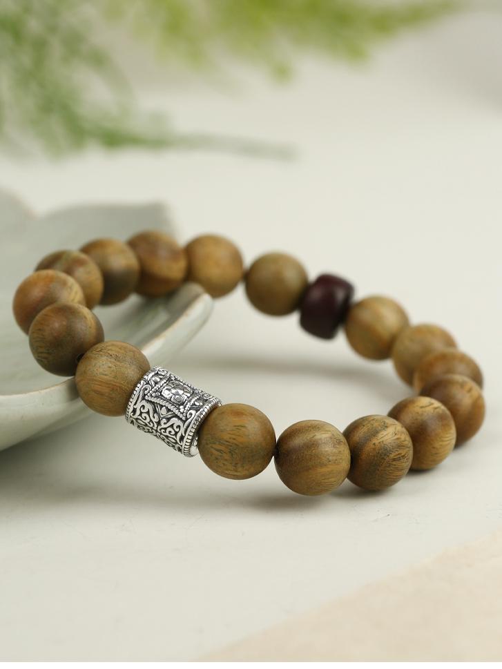 Tibetan Buddhist Jewelry Art: Green Sandalwood Sandalwood Prayer Beads featuring hand-painted Buddhist symbols