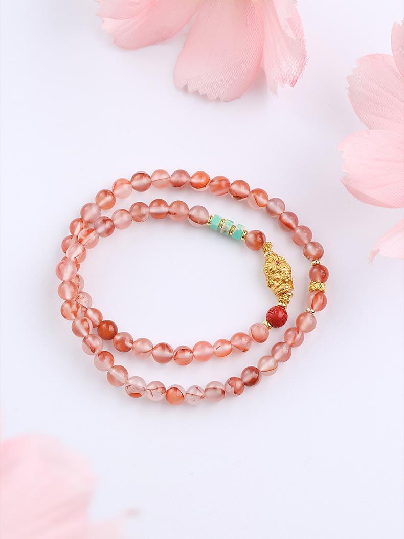 Tibetan Buddhist Jewelry Culture: Handmade Cinnabar Glass Multi-Circle Red Bracelet combining protective energy with vibrant spiritual practice