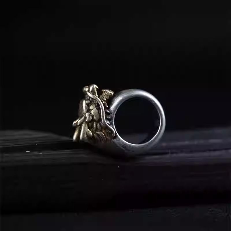  Exquisite vintage dragon head run loop accessory in silver/copper, a unique artifact rooted in Tibetan Buddhist Jewelry Culture for spiritual protection.