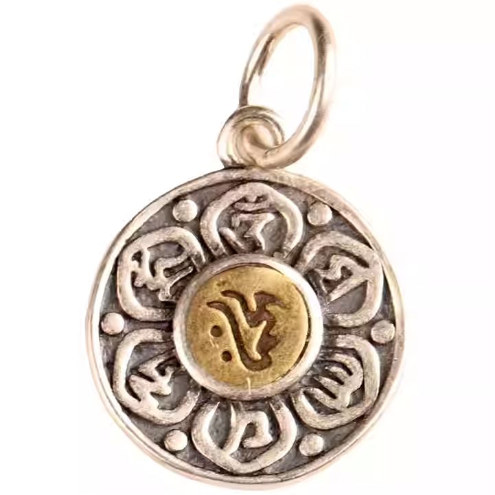 Exquisite silver lotus mantra side pendant, a spiritual artifact rooted in Tibetan Buddhist Jewelry Culture for purification.
