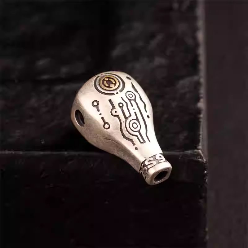  Handcrafted jewelry art sacred water drop mala pendant, representing wisdom and detachment in Tibetan traditions. 