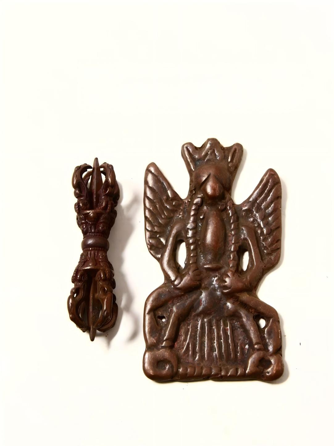 Handpainted Kun Gang Golden Winged Bird figure made of Lima copper, representing Tibetan Buddhist Jewelry Art, embodying divine strength and spiritual guidance.