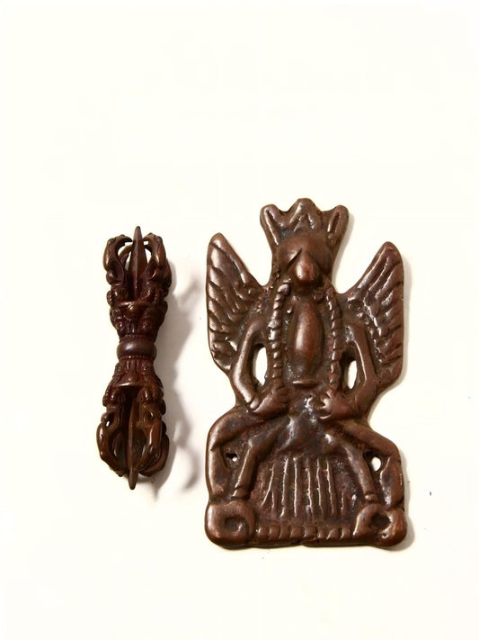 Handpainted Kun Gang Golden Winged Bird figure made of Lima copper, representing Tibetan Buddhist Jewelry Art, embodying divine strength and spiritual guidance.