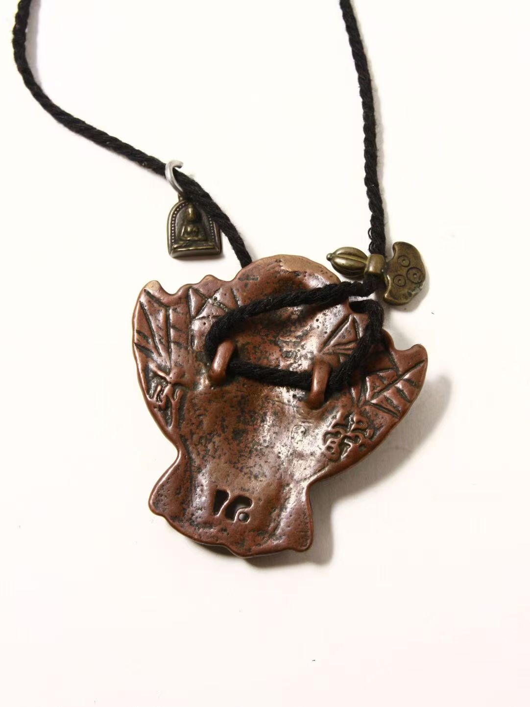 Kun Gang Phoenix in Lima copper with golden wings, part of a collection of Tibetan Buddhist Jewelry Art, symbolizing wisdom, protection, and divine blessings.