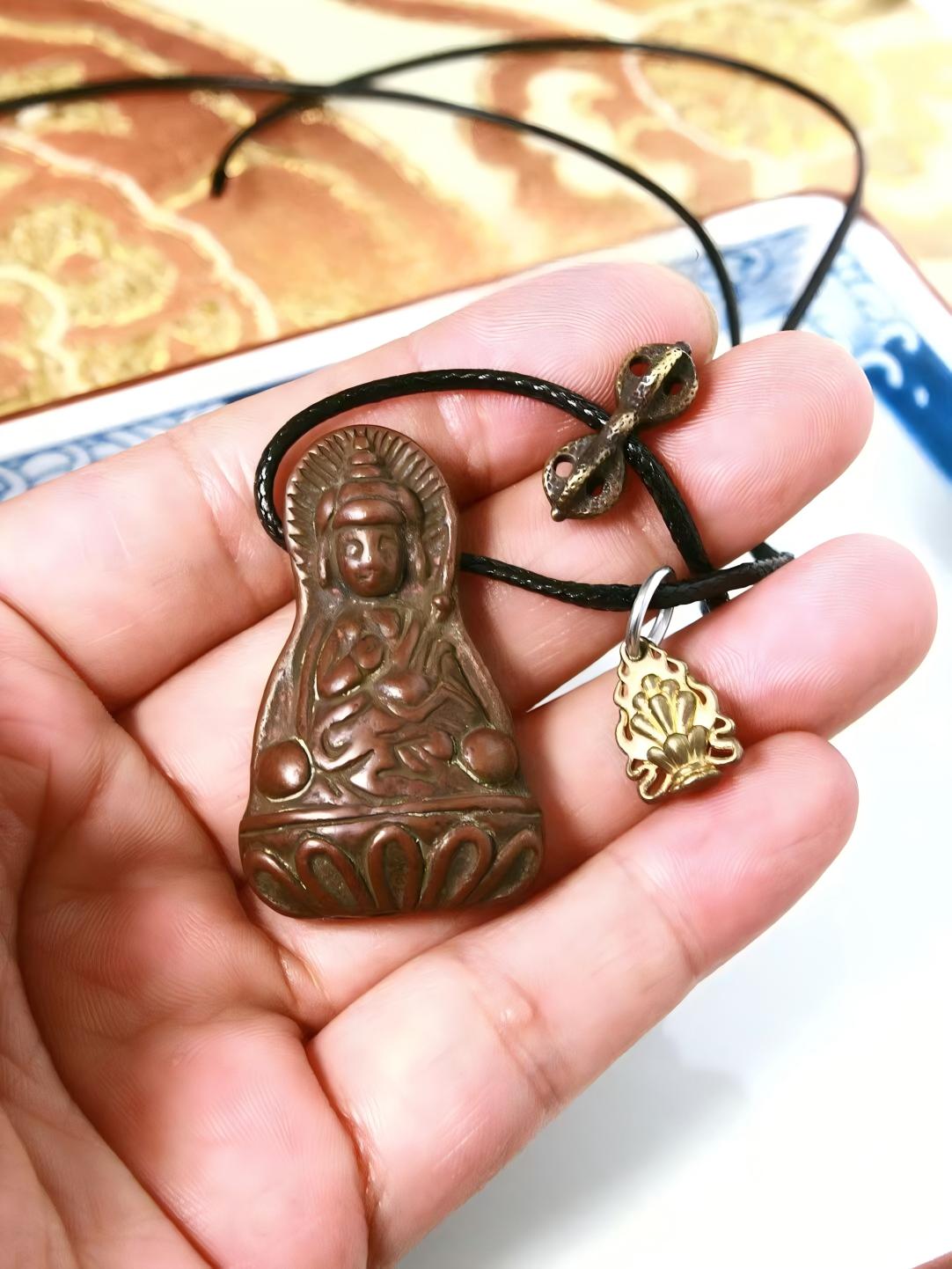 Handpainted Lotus Master statue featuring Vajra and Mani Jewel, crafted from Lima Copper, embodying spiritual protection and abundance in Tibetan Buddhist Jewelry.