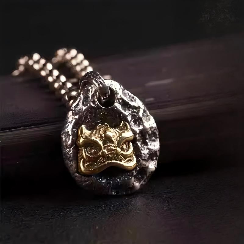 Bespoke Guochao Lion Dance pendant featuring natural stone, a masterpiece of Tibetan Buddhist Jewelry Culture aesthetics.
