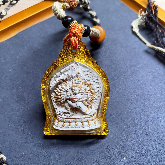 Mahakala protection Thangka amulet pendant from Tibetan Buddhist Jewelry Culture, hand-crafted Jewelry art necklace for spiritual balance and fortune