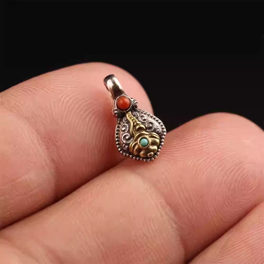 Mini hand-painted sterling silver Buddhist bracelet, a detailed example of Tibetan Buddhist Jewelry Culture and sacred jewelry art.