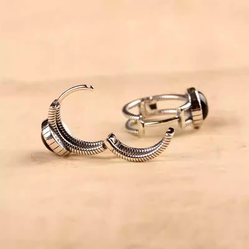 Bespoke minimalist black agate earrings, a masterpiece of spiritual calm and Tibetan Buddhist Jewelry Culture.