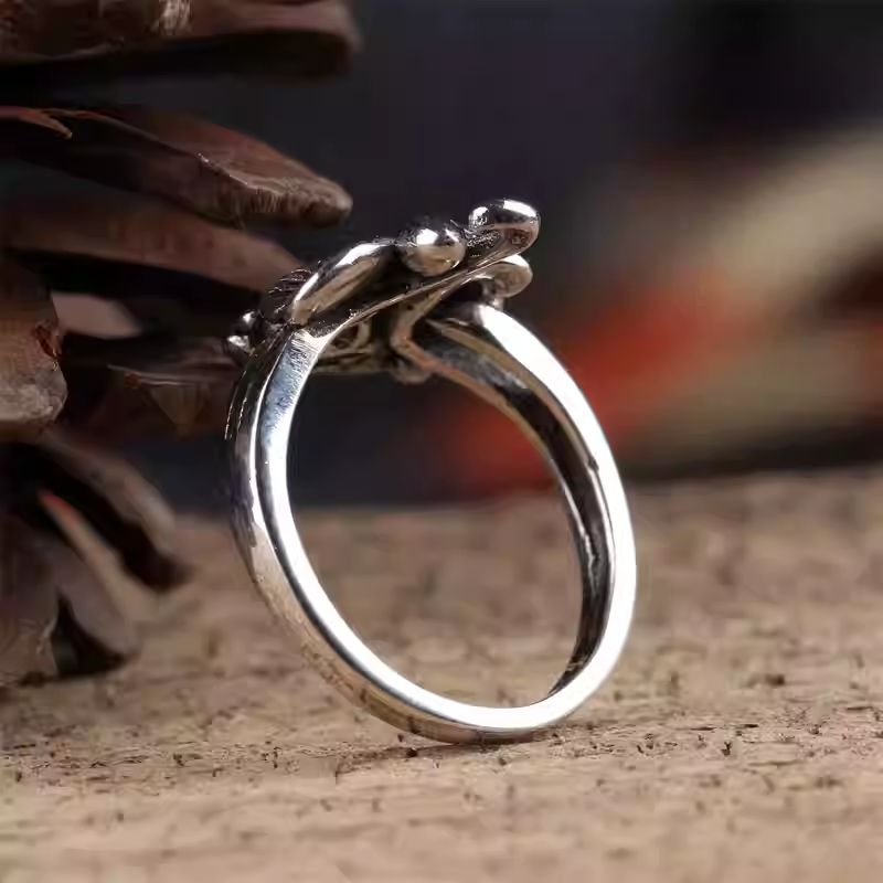 Artisan-crafted adjustable silver ring, combining Tibetan Buddhist Jewelry Culture aesthetics with modern Jewelry art.
