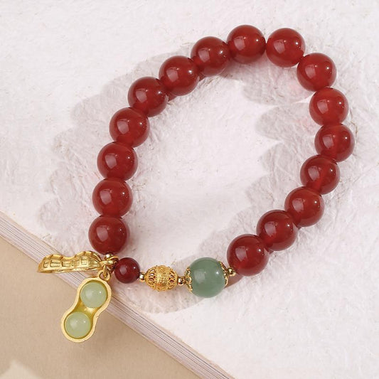 Detail shot of pure handmade Morning Blossom Carnelian Bracelet. Shows the smooth, lustrous agate beads and consistent hand-stringing craftsmanship, ensuring every piece is flawless.