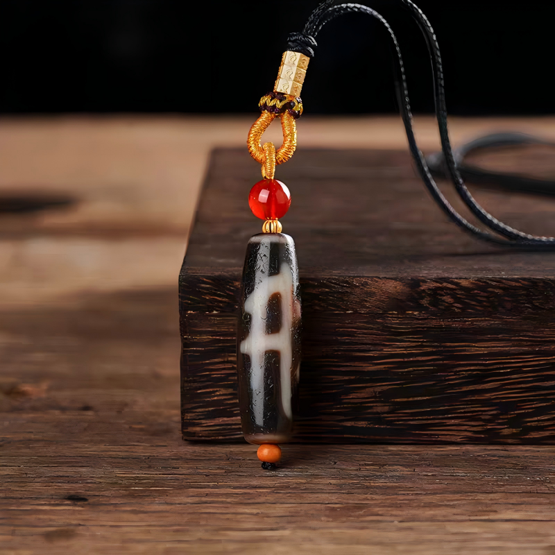  Authentic natural agate Dzi necklace with ancient spiritual patterns, rooted in Tibetan Buddhist Jewelry Culture for protection.