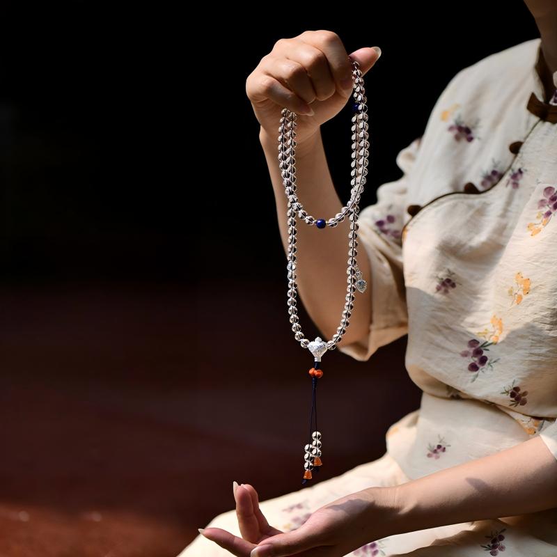 Tibetan Buddhist Jewelry Culture: Traditional pure natural crystal quartz necklace, reflecting elegant Buddhist jewelry art and spiritual clarity.