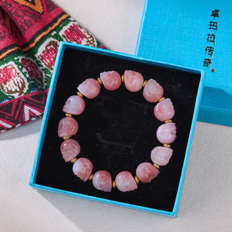 Pink Litchi frozen coralline multi-gem handmade bracelet from Tibetan Buddhist jewelry culture, combining spiritual meaning, beauty, and positive energy.