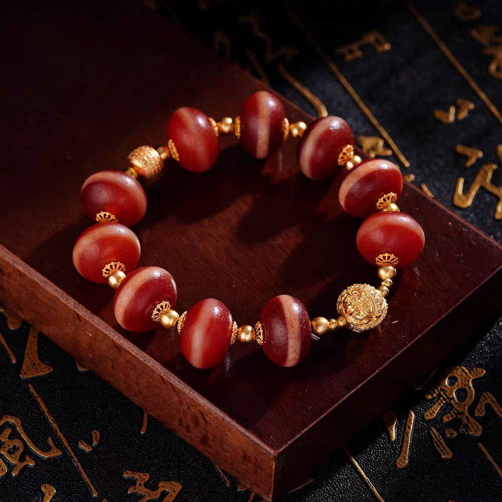 Natural red mutton Yakushi beads bracelet inspired by Tibetan Buddhist jewelry culture, handcrafted for men and women to enhance fortune and mindfulness.