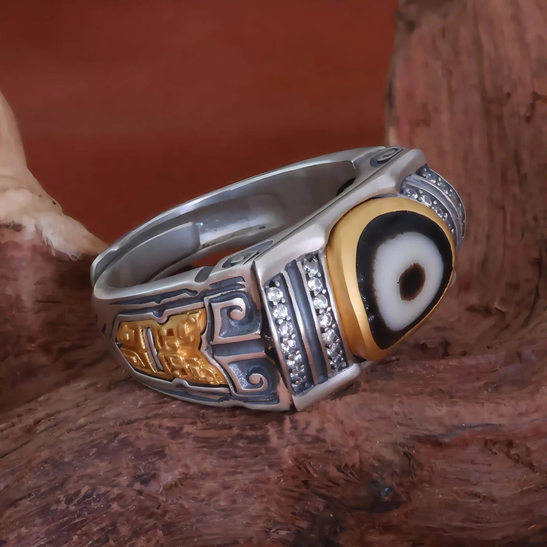 Close-up of a handmade silver ring highlighting fine jewelry art details within the rich heritage of Tibetan Buddhist Jewelry Culture.