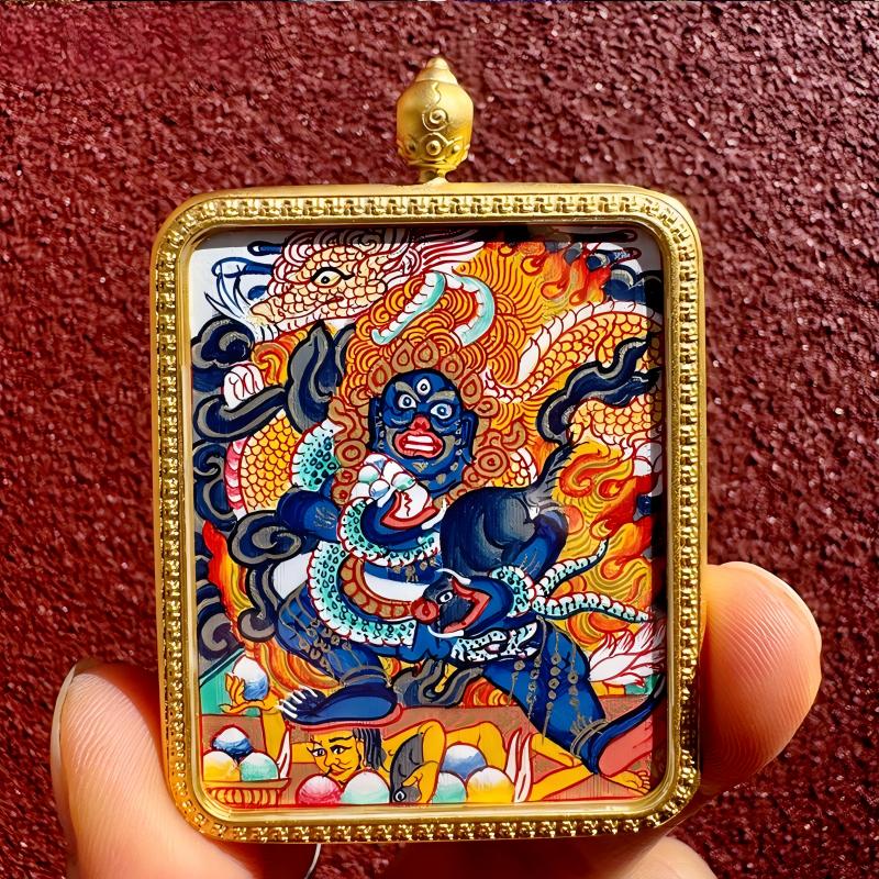 Tibetan-style pendant of Black Jambhala Thangka in Gau box, a sacred Tibetan Buddhist jewelry art piece symbolizing protection, fortune, and blessings.