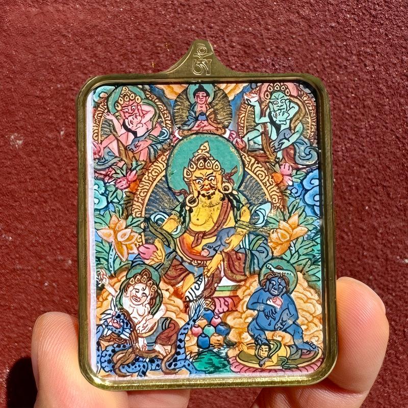 Tibetan-style Five Wealth Gods Gau Box necklace pendant, handcrafted with symbolic blessings of wealth and protection, authentic Tibetan Buddhist jewelry art.