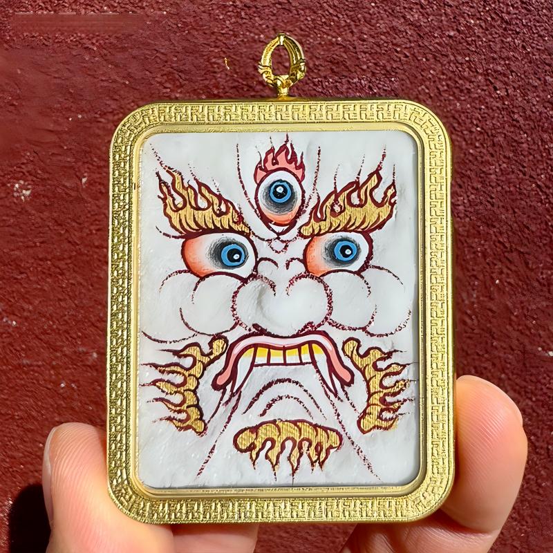 Tibetan-style Five Wealth Gods multi-color pendant with detailed faces, handcrafted as a sacred Buddhist talisman and fine Tibetan jewelry art.