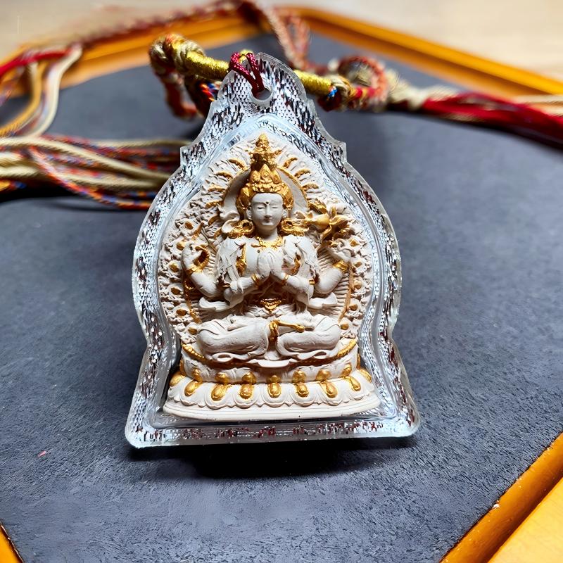 Tibetan-style pendant of Four-Armed Avalokiteshvara Ash Thangka in Gau box, a sacred Tibetan Buddhist jewelry art piece symbolizing protection, blessings, and spiritual strength.