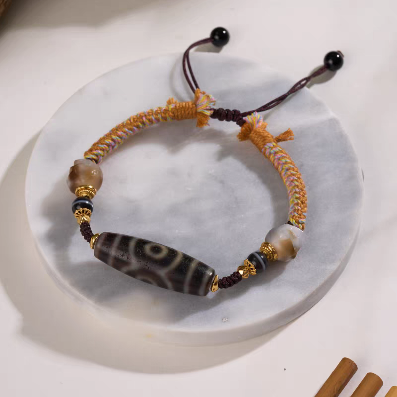 Pure handmade Panda Three-Eye Dzi bracelet, merging Tibetan Buddhist jewelry culture with unique jewelry art for daily wear and spiritual protection.