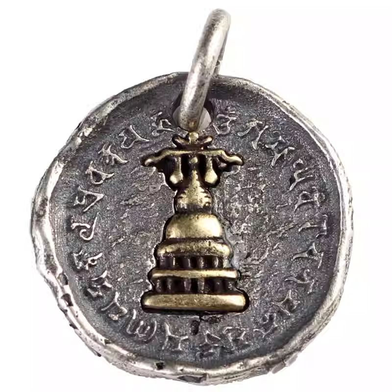 Handcrafted jewelry art sacred stupa mala pendant, representing Buddha's wisdom and enlightenment in Tibetan traditions.