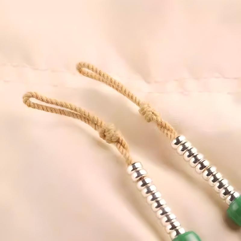 Handmade Tibetan mini silver beads with spacers and connector for DIY bracelets, blending craftsmanship, spirituality, and ethnic style.