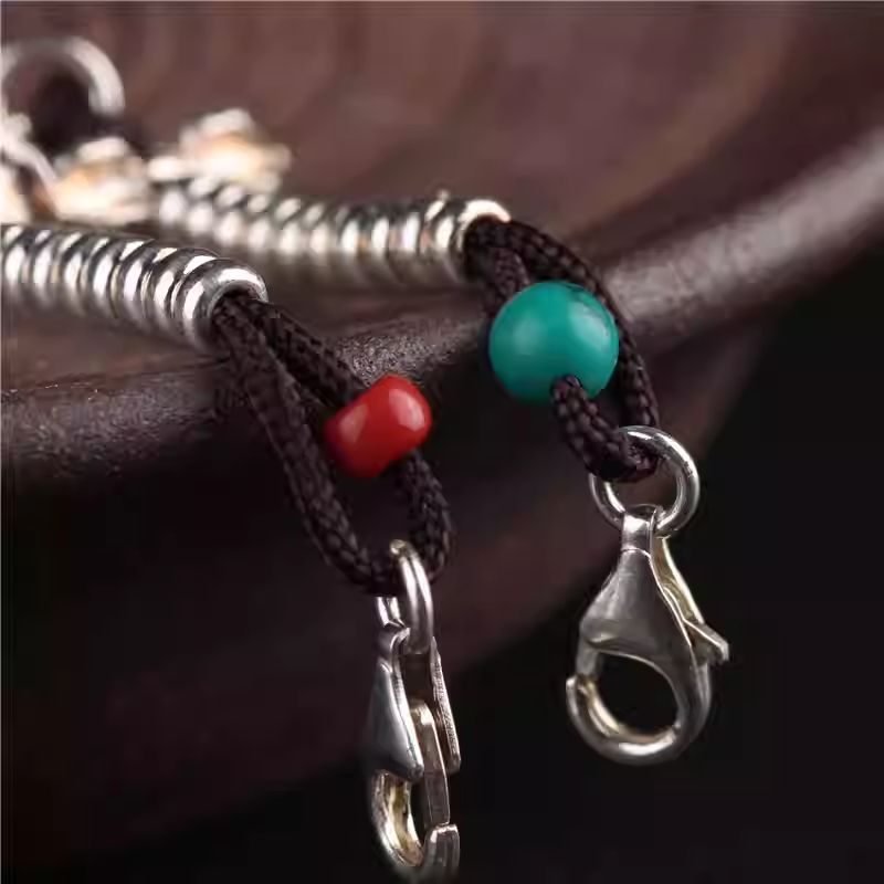 Handmade silver goldfish side hanging pendant, Tibetan-style DIY bead accessory, perfect for personalized bracelets or spiritual jewelry gifts.