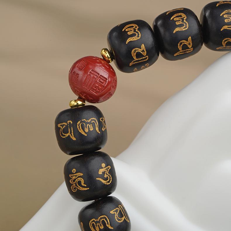 Elegant hand-painted ebony and red sand bracelet, a classic piece inheriting the artistry of Tibetan Buddhist jewelry.