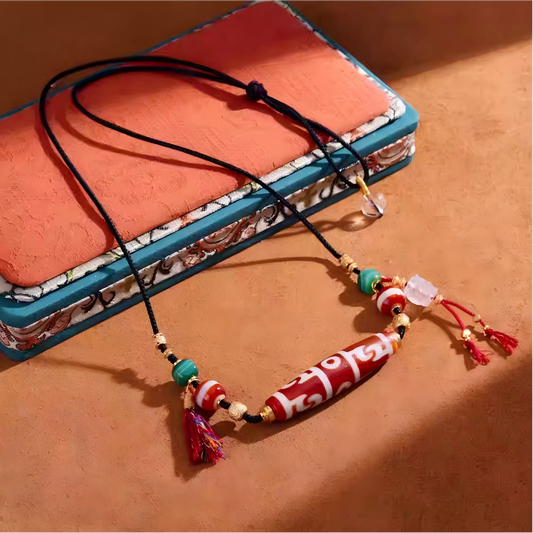 Purely handmade natural red agate sacred Dzi beads, reflecting the heritage of Tibetan Buddhist Jewelry Culture jewelry art.
