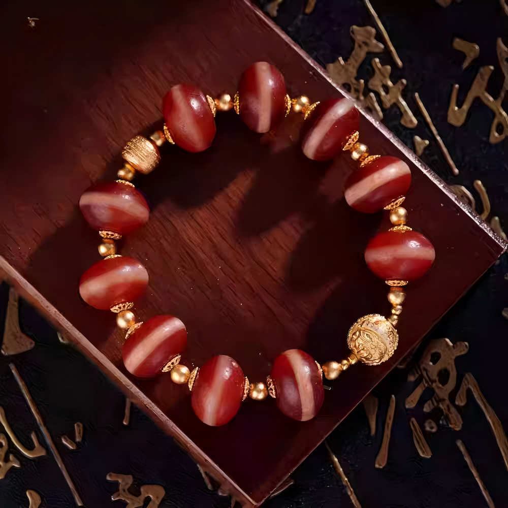 Red mutton Yakushi multi-gem handmade bracelet from Tibetan Buddhist jewelry culture, combining spiritual meaning, beauty, and luck.