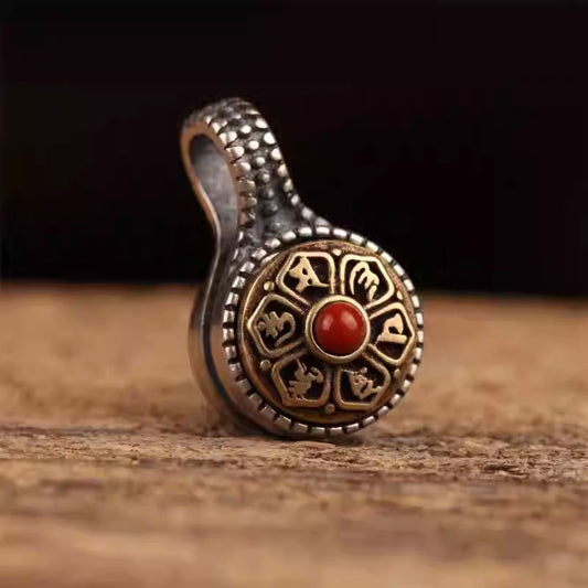 Handmade rotatable silver and copper beads representing Tibetan Buddhist Jewelry Culture, a unique piece of interactive jewelry art.
