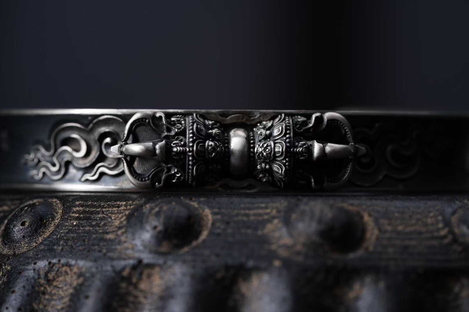 Tibetan Buddhist Jewelry Culture S925 Vajra bangle open design showcasing precision inlay work and traditional Tibetan Jewelry art aesthetics.